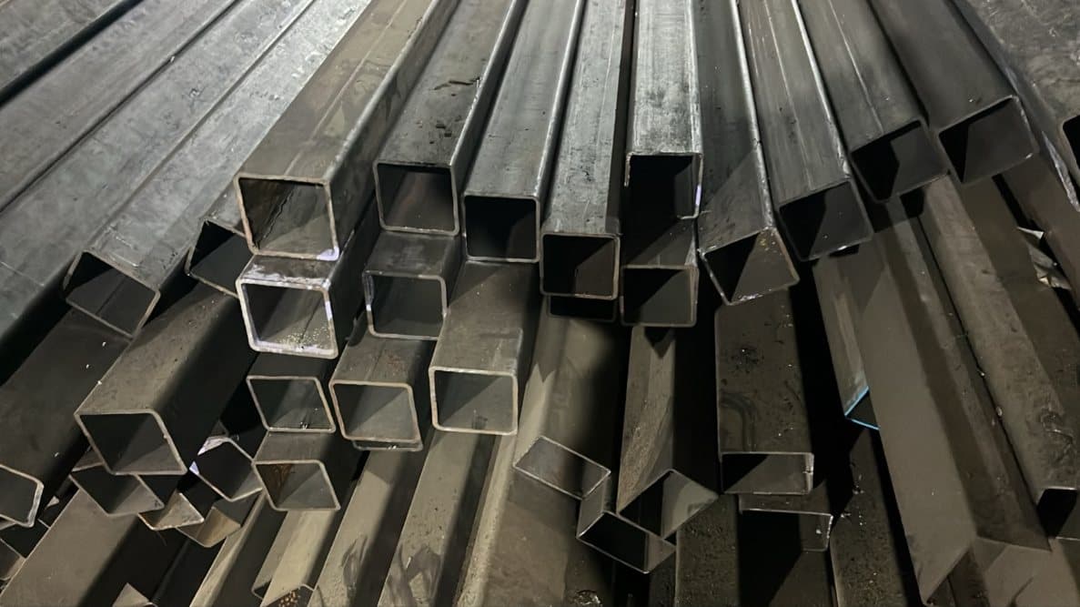 Bundles of MS square tubes stacked at the stockyard