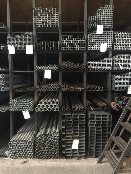 Rack of round, square and rectangular MS pipes and tubes