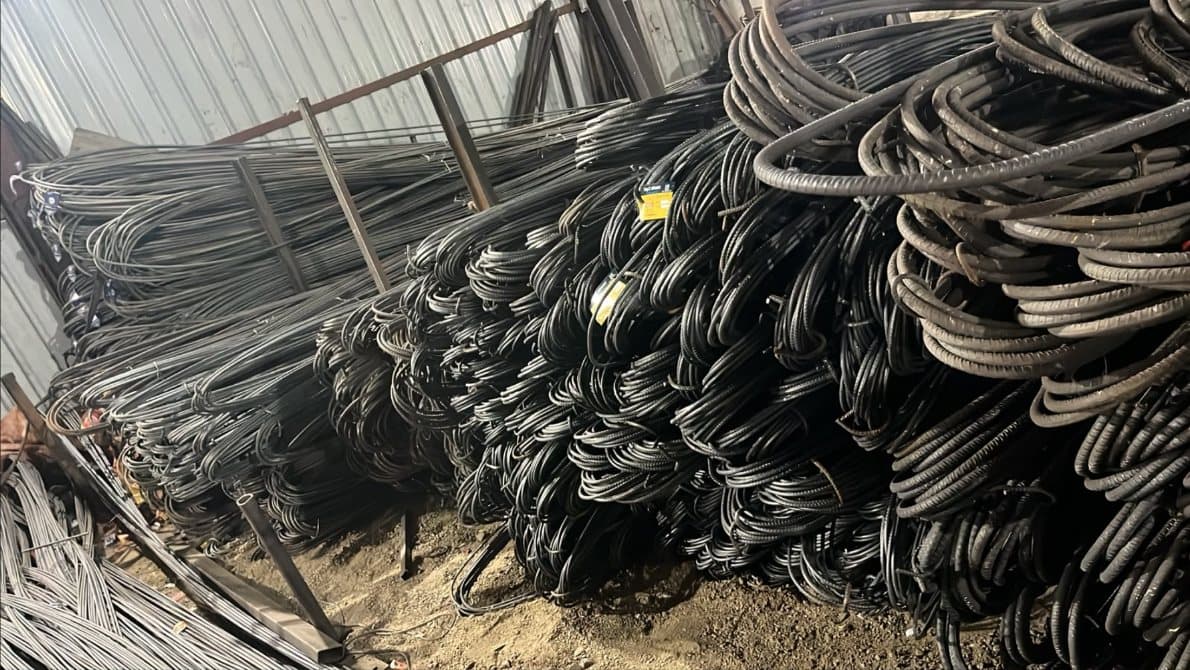 TMT bar coils and bundles stocked inside the warehouse